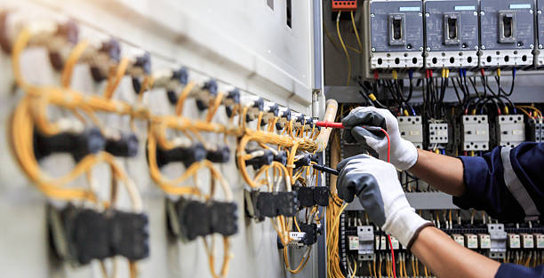 Professional Electrician technician working in Old River-Winfree, TX